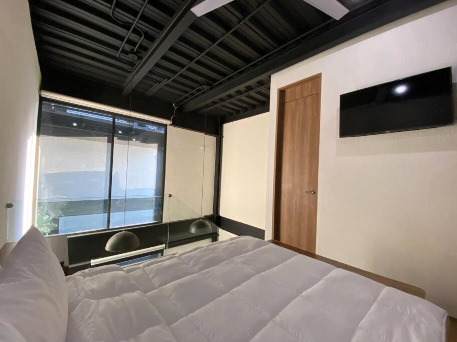 Loft Doble Altura / Chapu 102 @serra Apartment *